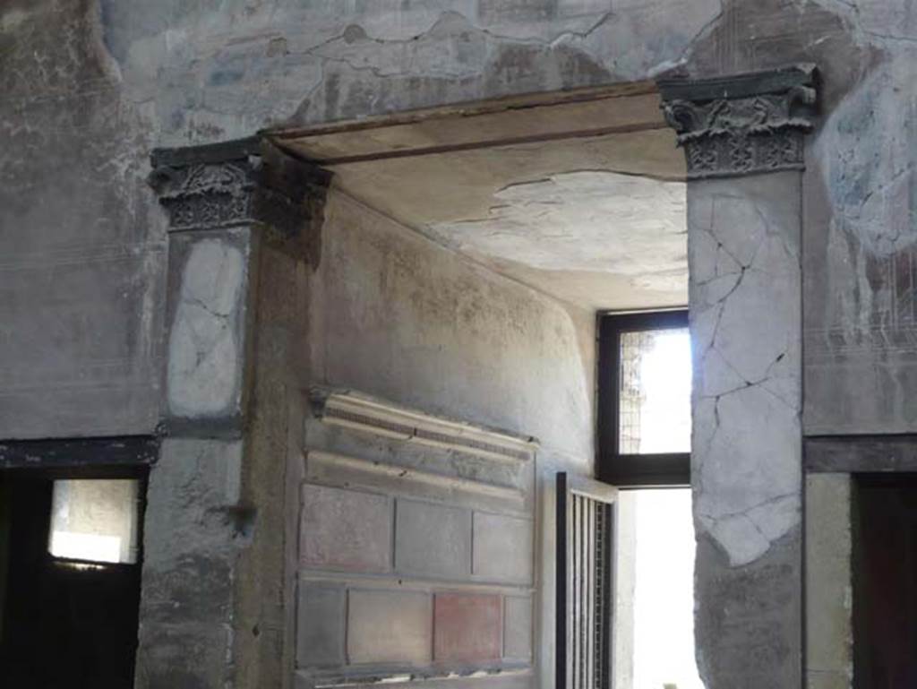 V.1 Herculaneum. August 2013. Capitals above entrance corridor, at west end of atrium. Photo courtesy of Buzz Ferebee.
